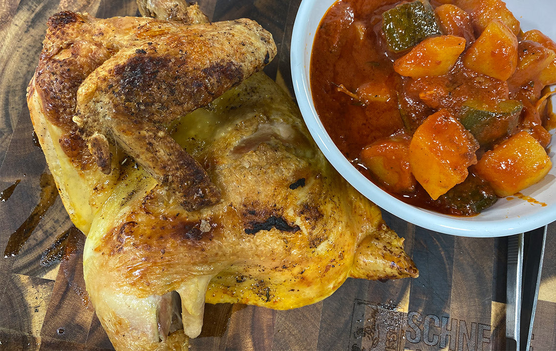 Halbes Hähnchen aus dem Ofen mit Zucchini-Kartoffelgemüse