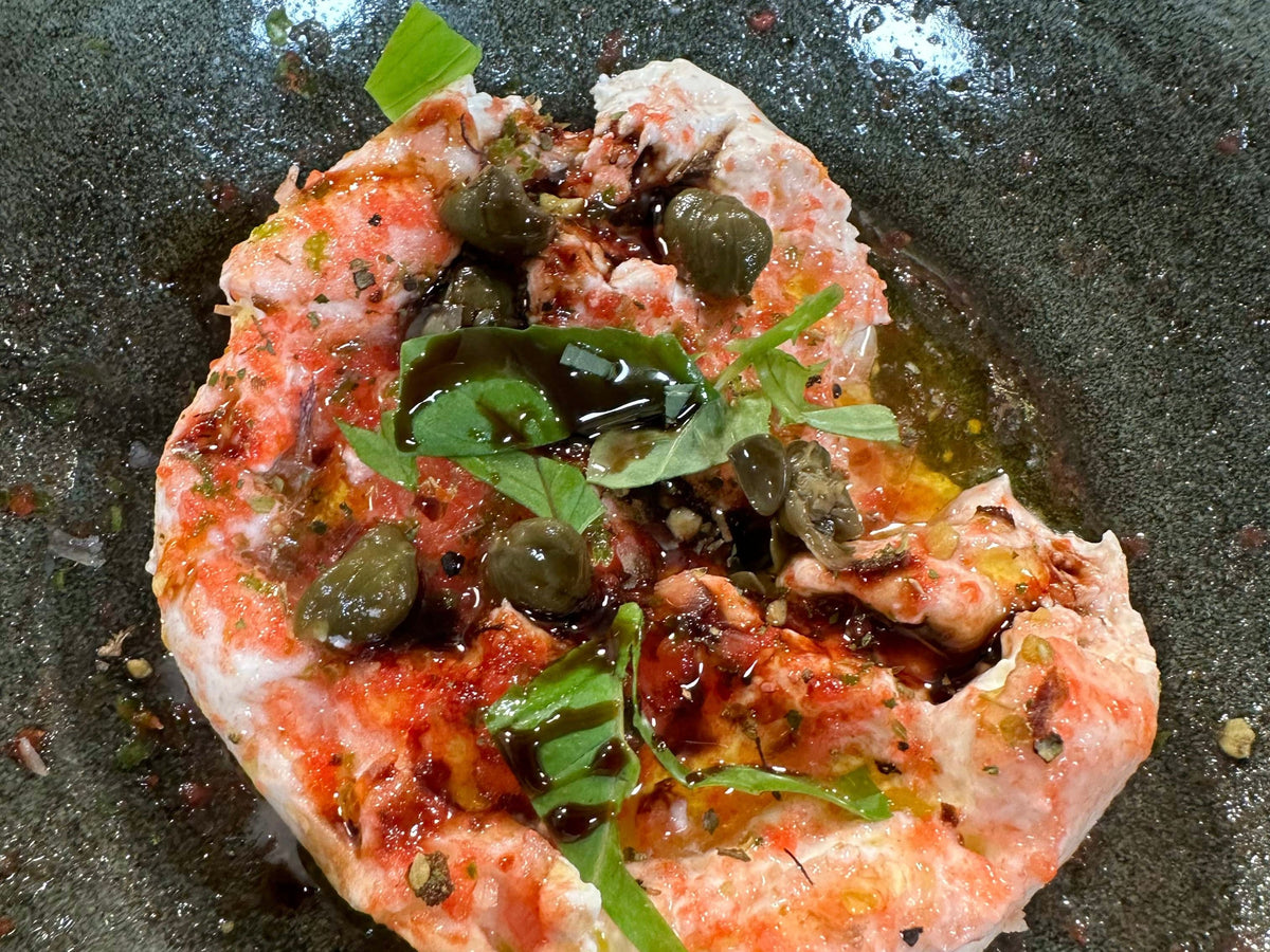 Burrata mit gefrorener Tomate