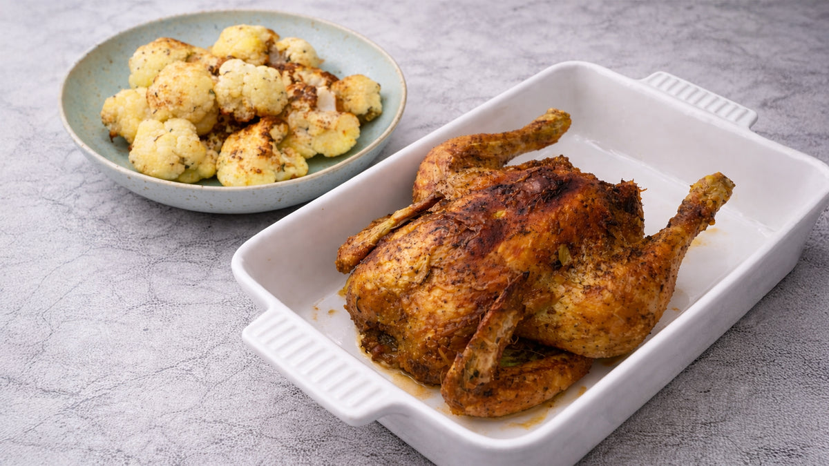 Ganzes Brathähnchen mit Blumenkohl im Airfryer